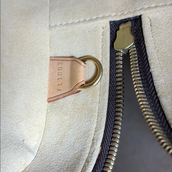 Authentic Louis Vuitton Cite GM - Picture 15 of 15